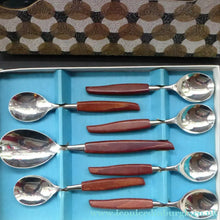 Load image into Gallery viewer, Vintage 1960s GLOSSWOOD Cutlery. Stainless Steel Six Dessert Spoons &amp; Larger Serving Spoon with Teak Effect Handles. Original Retail Box
