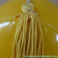 Load image into Gallery viewer, 1960s KIKU Yellow Plastic Dusting Powder Ball. With original fluffy puff and sealed Faberge talcum powder
