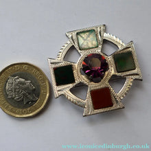 Load image into Gallery viewer, Vintage SCOTTISH SILVER Celtic Style Brooch with Central Amethyst. Edinburgh Hallmark for 1960
