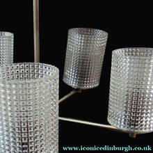 Load image into Gallery viewer, 1960s Glass MODERNIST / BRUTALIST Pendant Chandelier - Stainless Steel Radiating Arms with Clear Hobnail Glass Shades 
