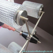 Load image into Gallery viewer, 1960s Glass MODERNIST / BRUTALIST Pendant Chandelier - Stainless Steel Radiating Arms with Clear Hobnail Glass Shades 
