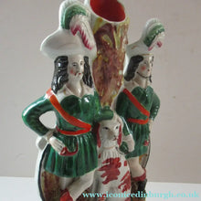 Load image into Gallery viewer, Antique Victorian Spill Vase Featuring a Pair of Huntsmen Wearing Short Green Tunics with a Large Dog
