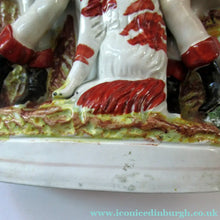 Load image into Gallery viewer, Antique Victorian Spill Vase Featuring a Pair of Huntsmen Wearing Short Green Tunics with a Large Dog
