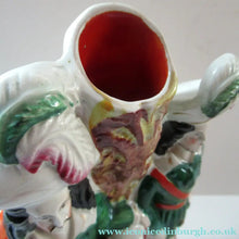 Load image into Gallery viewer, Antique Victorian Spill Vase Featuring a Pair of Huntsmen Wearing Short Green Tunics with a Large Dog
