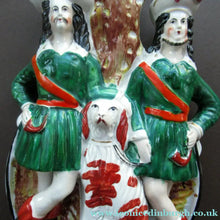 Load image into Gallery viewer, Antique Victorian Spill Vase Featuring a Pair of Huntsmen Wearing Short Green Tunics with a Large Dog
