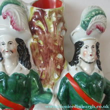 Load image into Gallery viewer, Antique Victorian Spill Vase Featuring a Pair of Huntsmen Wearing Short Green Tunics with a Large Dog
