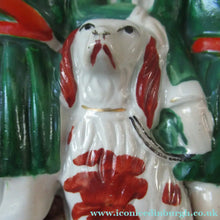 Load image into Gallery viewer, Antique Victorian Spill Vase Featuring a Pair of Huntsmen Wearing Short Green Tunics with a Large Dog
