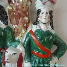 Load image into Gallery viewer, Antique Victorian Spill Vase Featuring a Pair of Huntsmen Wearing Short Green Tunics with a Large Dog
