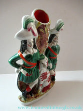Load image into Gallery viewer, Antique Victorian Spill Vase Featuring a Pair of Huntsmen Wearing Short Green Tunics with a Large Dog - Staffordshire
