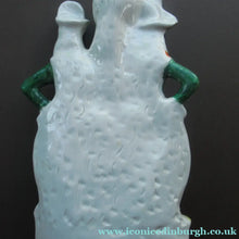 Load image into Gallery viewer, Antique Victorian Spill Vase Featuring a Pair of Huntsmen Wearing Short Green Tunics with a Large Dog

