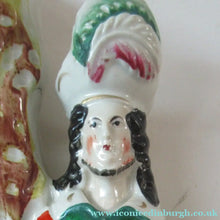 Load image into Gallery viewer, Antique Victorian Spill Vase Featuring a Pair of Huntsmen Wearing Short Green Tunics with a Large Dog
