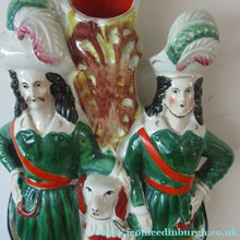 Load image into Gallery viewer, Antique Victorian Spill Vase Featuring a Pair of Huntsmen Wearing Short Green Tunics with a Large Dog
