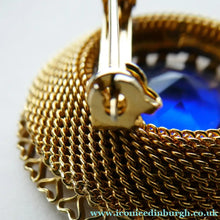 Load image into Gallery viewer, Vintage Costume Brooch with Heart Shapes on Rim and Blue Faceted Glass Insert
