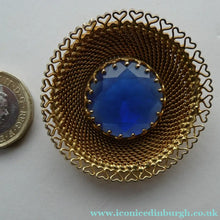 Load image into Gallery viewer, Vintage Costume Brooch with Heart Shapes on Rim and Blue Faceted Glass Insert
