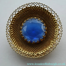 Load image into Gallery viewer, Vintage Costume Brooch with Heart Shapes on Rim and Blue Faceted Glass Insert
