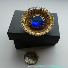Load image into Gallery viewer, Vintage Costume Brooch with Heart Shapes on Rim and Blue Faceted Glass Insert
