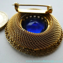 Load image into Gallery viewer, Vintage Costume Brooch with Heart Shapes on Rim and Blue Faceted Glass Insert
