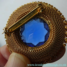 Load image into Gallery viewer, Vintage Costume Brooch with Heart Shapes on Rim and Blue Faceted Glass Insert
