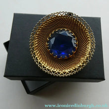 Load image into Gallery viewer, Vintage Costume Brooch with Heart Shapes on Rim and Blue Faceted Glass Insert
