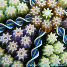 Load image into Gallery viewer, Scottish PERTHSHIRE Paperweight. Dark Aqua Ground. 6 Spokes &amp; Millefiori Canes with P Cane
