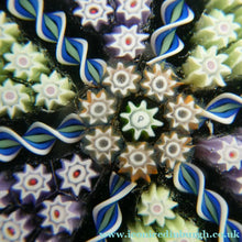 Load image into Gallery viewer, Scottish PERTHSHIRE Paperweight. Dark Aqua Ground. 6 Spokes &amp; Millefiori Canes with P Cane
