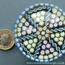 Load image into Gallery viewer, Scottish PERTHSHIRE Paperweight. Dark Aqua Ground. 6 Spokes &amp; Millefiori Canes with P Cane
