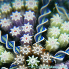 Load image into Gallery viewer, Scottish PERTHSHIRE Paperweight. Dark Aqua Ground. 6 Spokes &amp; Millefiori Canes with P Cane
