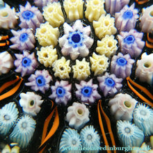Load image into Gallery viewer, Scottish PERTHSHIRE Paperweight. Dark Blue Ground, 10 Short Spokes &amp; Millefiori Canes
