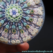 Load image into Gallery viewer, 1970s Perthshire Glass Paperweight. Pale Blue Ground Fourteen Spokes &amp; Millefiori Canes. Label to Base - Paperweight
