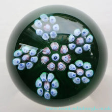 Load image into Gallery viewer, 1970s Perthshire Glass Paperweight with Star-Shaped Clusters on Transluscent Emerald Green Base (PP10)
