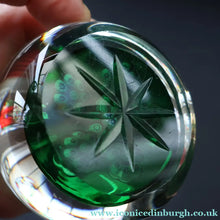 Load image into Gallery viewer, 1970s Perthshire Glass Paperweight with Star-Shaped Clusters on Transluscent Emerald Green Base (PP10)
