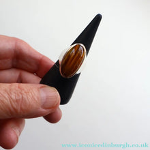 Load image into Gallery viewer, Vintage 1977 Hallmarked Space Age Silver Rings with Oval Tiger's Eye Inclusion. Size O
