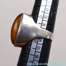 Load image into Gallery viewer, Vintage 1977 Hallmarked Space Age Silver Rings with Oval Tiger's Eye Inclusion. Size O
