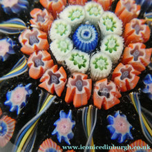 Load image into Gallery viewer, Scottish PERTHSHIRE Paperweight. Dark Black Ground. 10 Half Spokes &amp; Millefiori Canes

