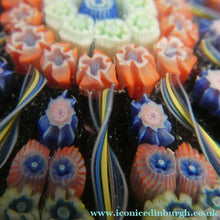 Load image into Gallery viewer, Scottish PERTHSHIRE Paperweight. Dark Black Ground. 10 Half Spokes &amp; Millefiori Canes
