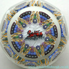 Load image into Gallery viewer, Vintage 1980s PERTHSHIRE PAPERWEIGHT. Millefiori Ground with Train Motif (PP 56)
