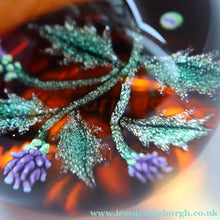 Load image into Gallery viewer, Vintage LIMITED EDITION 1992 Caithness Glass Paperweight. Entitled "Thistles" by William Manson. With WM Cane
