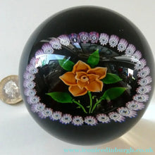 Load image into Gallery viewer, 2000 Caithness Glass Paperweight with Lampwork Flower. 100th Birthday of the Queen Mother
