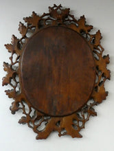 Load image into Gallery viewer, Antique 1880s BLACK FOREST WALL MIRROR Decorated with Oak Leaves and Acorns
