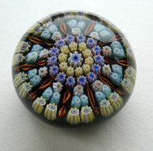 Load image into Gallery viewer, Scottish PERTHSHIRE Paperweight. Dark Blue Ground, 10 Short Spokes &amp; Millefiori Canes
