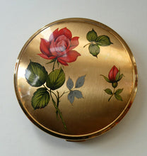 Load image into Gallery viewer, Vintage 1960s POWDER COMPACT with Red Rose and Wee Rose Bud. Gold Tone Background
