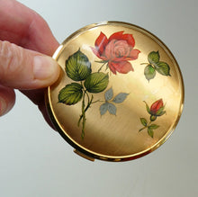 Load image into Gallery viewer, Vintage 1960s POWDER COMPACT with Red Rose and Wee Rose Bud. Gold Tone Background
