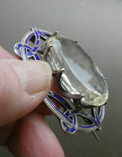 Load image into Gallery viewer, Antique Victorian Silver and Blue Enamel Brooch with Large Faceted Paste Stone
