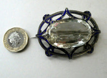 Load image into Gallery viewer, Antique Victorian Silver and Blue Enamel Brooch with Large Faceted Paste Stone
