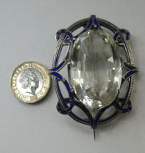 Load image into Gallery viewer, Antique Victorian Silver and Blue Enamel Brooch with Large Faceted Paste Stone
