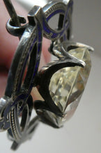 Load image into Gallery viewer, Antique Victorian Silver and Blue Enamel Brooch with Large Faceted Paste Stone
