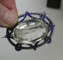 Load image into Gallery viewer, Antique Victorian Silver and Blue Enamel Brooch with Large Faceted Paste Stone
