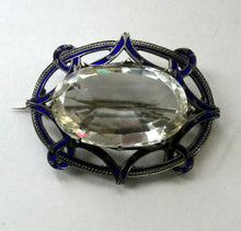 Load image into Gallery viewer, Antique Victorian Silver and Blue Enamel Brooch with Large Faceted Paste Stone
