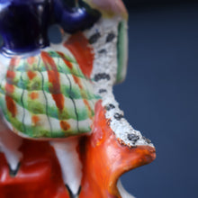 Load image into Gallery viewer, Antique STAFFORDSHIRE Figurine. Little Child in Kilt Standing on a Chair. A Pheasant Perching on Chair Back
