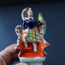 Load image into Gallery viewer, Antique STAFFORDSHIRE Figurine. Little Child in Kilt Standing on a Chair. A Pheasant Perching on Chair Back
